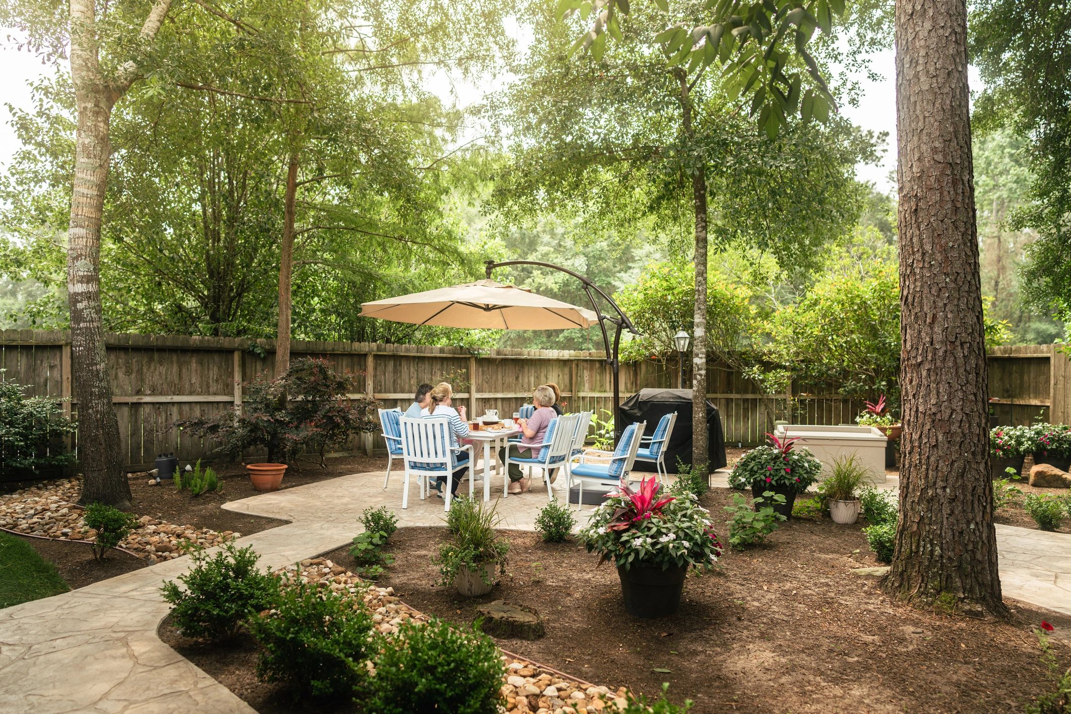 Outdoor event seating arranged beneath a tent