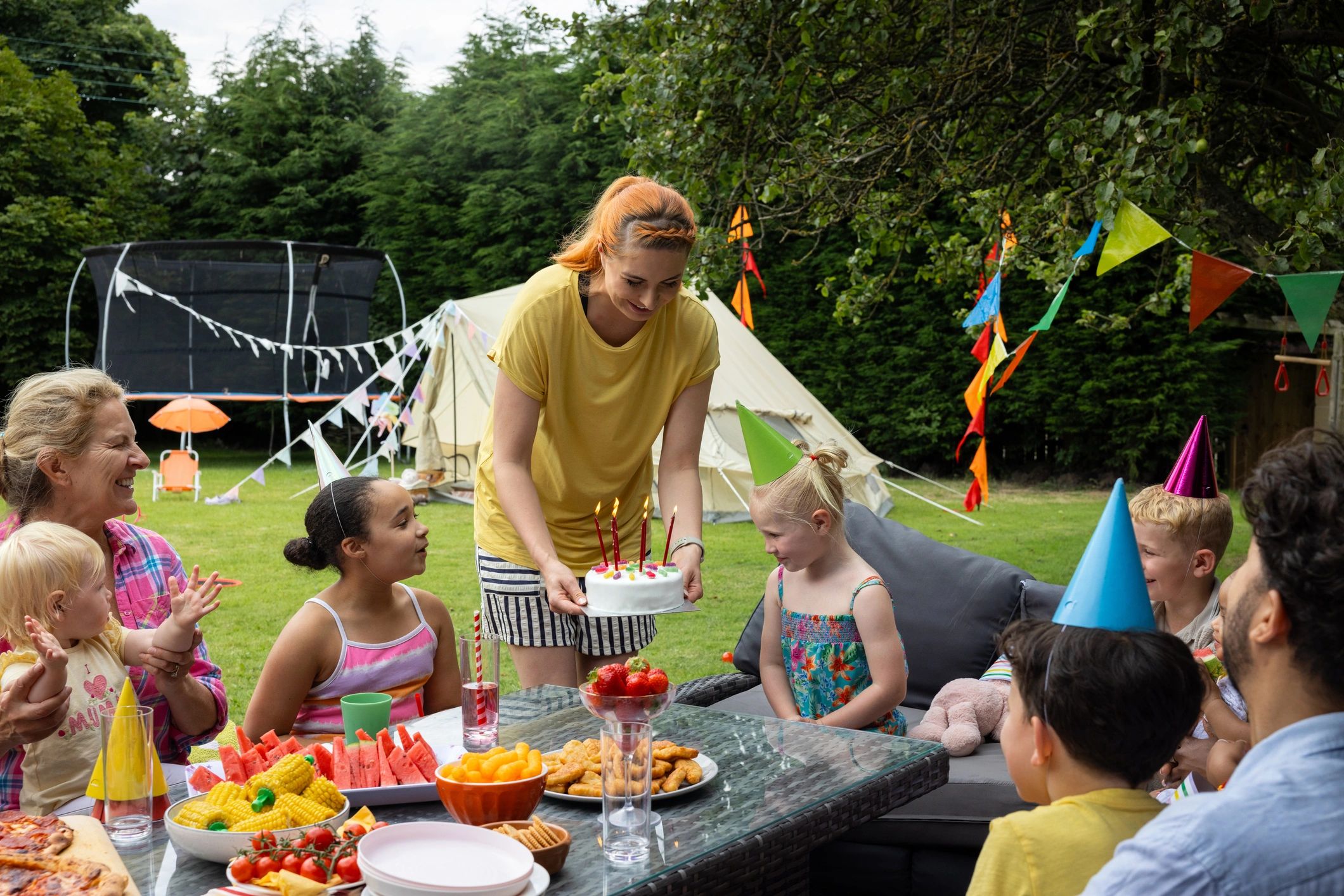 Outdoor party setup with tent coverage